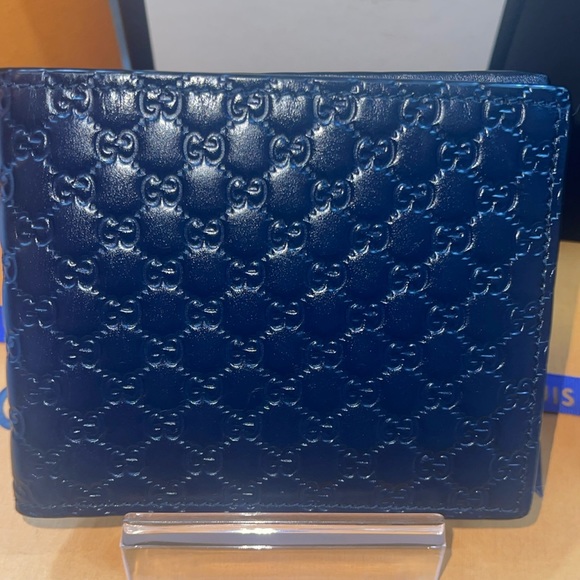 Gucci Handbags - NWOT Navy Micro Gucci Guccissima bifold wallet